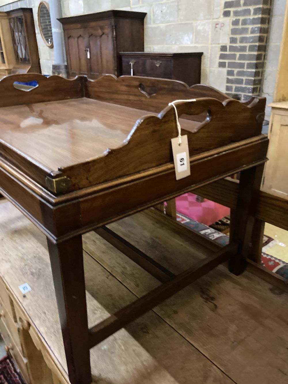 A Victorian rectangular mahogany butlers tray on later stand, width 79cm depth 53cm height 48cm